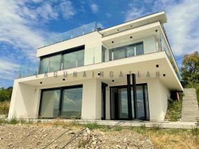 Budakörnyék Szentendre vadonat új minimál, örök panorámás családi ház eladó